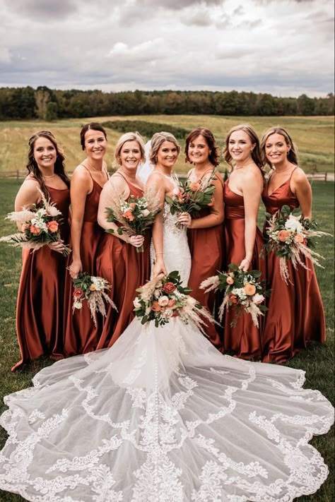 Rust Country Wedding Colors for 2024, Rust Bridesmaid Dresses, Rust Wedding Bouquets - ColorsBridesmaid Bridesmaids Country Wedding, Western Bridesmaid Dresses Fall, Western Style Bridesmaid Dresses, Rust Country Wedding, Country Wedding Dress Ideas, Rust Brown Wedding Theme, Wedding Color Schemes Western, Bridesmaid Dresses Terra Cotta, Rustic Orange Bridesmaid Dresses