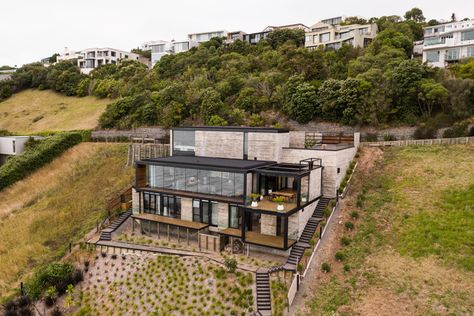 Concrete was a necessity on the very steep, geotechnically challenging site, so we chose to embrace it. Downhill House, Slope House Design, House On Slope, Cedar Shiplap, Sloping Lot House Plan, Slope House, Hillside House, Clerestory Windows, H Design