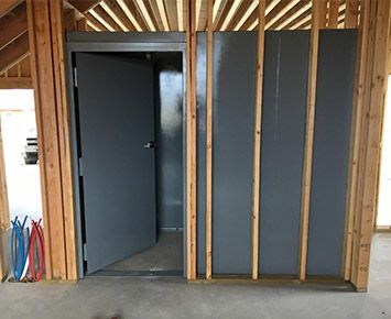 Hidden Storm Shelter Safe Room, How To Build A Safe Room, Built In Safe Room, Hidden Storm Shelter, Safe Room Ideas Storm Shelters, Basement Tornado Shelter, Safe Rooms In Houses Storm Shelters, Fireproof Safe Room, How To Build A Safe Room In Your House