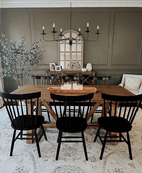 Dining Room With Concrete Table, Wooden Table Black Legs Dining Rooms, Wooden Dining Room Table With Black Chairs, Wooden Kitchen Table With Black Chairs, Dining Room Inspiration Moody, Boho Modern Dining Room Decor, Dark Stain Kitchen Table, Moody Organic Modern Dining Room, Dinning Room Farmstyle