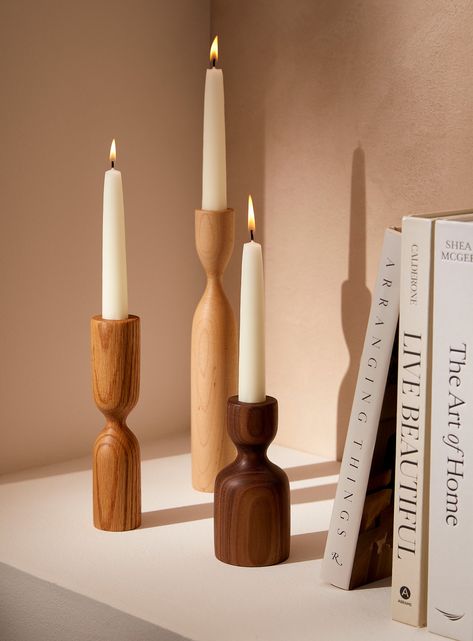 Minimalist wooden candleticks to add a Scandinavian vibe to your décor. Perfect for Christmas, they can stay all year long on you mantel or your wall shelves. Awesome on a mantel for a perfect Christmas vibe. Perfect for taper candles. 6'', 8'' and 10'' candles are our favorite choice.Make sure to never leave your candleholders lighted up without supervision. Do not let the candles burn down more than 0.5 inch from the wood.  This listing is for a set of 3. Each candlestick is hand turned. Wood Scandinavian Candle Decor, Turned Candle Holders, Scandinavian Candles, Hand Dipped Candles, Decorative Set, Slow Design, Wood Plant Stand, Modern Dining Room Tables, Large Candle Holders