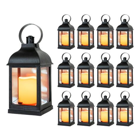 PRICES MAY VARY. 12 PIECE SET 10" DECORATIVE LANTERNS with Flameless LED Lighted Candle, 5HR Timer, Weather Resistant - Decorative Outdoor Lanterns - Black. Perfect for your home, garden, patio or weddings! VINTAGE DESIGN WITH RUSTIC CHARM - These classic lanterns are made with durable weatherproof plastic so you can use them outdoors and not have to worry about them rusting. The side panels are made of glass that helps create realistic lighting effect. Each Lantern features a Convenient Carry R Rustic Lantern Decor, Wedding Luminaries, Outdoor Wedding Lighting, Decorative Lanterns, Outdoor Lantern Lighting, Antique Lanterns, String Lights Wedding, Small Lanterns, Lantern Candle Decor