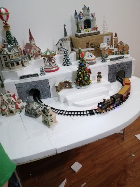 Easy Christmas Village Display Ideas, Table For Christmas Village, Christmas Village Buildings, Christmas Train Village, Christmas Village With Train Display, Mini Christmas Town, Christmas Decor Ideas Village, Christmas Village Platform Diy, Christmas Train Display Ideas