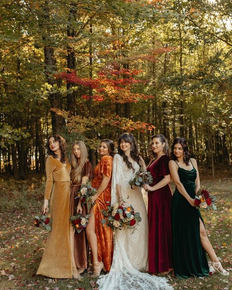 Outdoor bride and bridesmaids portraits with the brides wearing mismatched colored dresses. See more fall wedding color schemes, boho fall wedding ideas, and ideas for your fall wedding bouquets! Book Marissa as your documentary Michigan wedding photographer at marissadillonphotography.com! Fall Wedding Dress Bridesmaid, Mix Matched Fall Bridesmaid Dresses, European Autumn Wedding, Fall Wedding Colors Bridesmaids, Fall Wedding Eclectic, Unique Mismatched Bridesmaid Dresses, Fall Wedding Velvet Bridesmaid Dresses, Fall Pallet Bridesmaid Dresses, Wedding Inspiration Fall Color Schemes