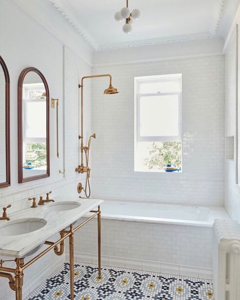 Complete with pedestal sinks, clawfoot tubs, and square subway tile walls, these 14 retro bathrooms are proof that modern isn't always best. Bathroom Shower With Window Ideas, Bathtub With Pony Wall, Bathroom Inspo With Tub, Modern 1920s Bathroom, Floor To Ceiling Subway Tile Bathroom, Funky Tile Bathroom, Tiled In Bath, Transitional Shower Tile Ideas, Narrow Primary Bathroom