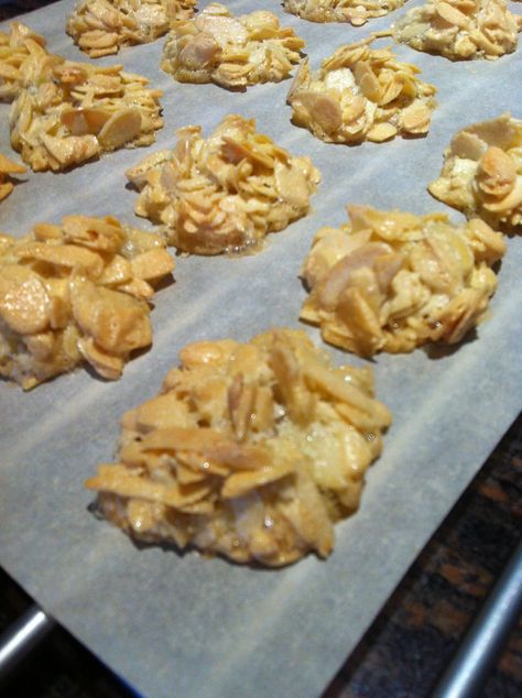 These cookies are so delicious.  I had them in Turks and Caicos.  I used to walk 10 minutes every morning in the scorching heat in the month of July to get some. Ingredients 2 Egg whites or ¼ cup L... Sliced Almond Cookies, Sliced Almonds Recipes, Asian Garlic Noodles, Egg White Cookies, Florentine Cookies, Almond Desserts, Italian Almond Cookies, Almond Meal Cookies, Liquid Egg Whites