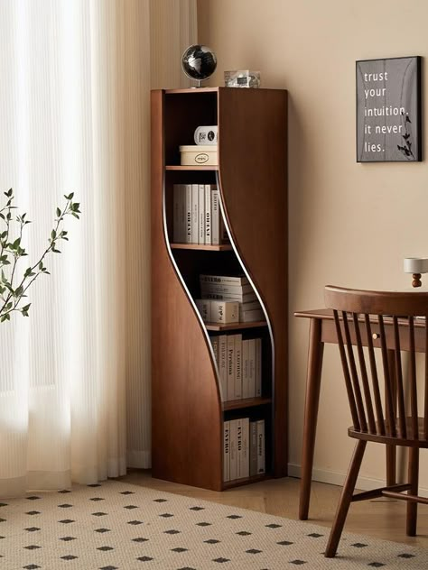 This elegantly unique bookshelf will breathe life into every corner of your home with its free-standing cabinet design, ensuring stability and sturdiness. The simple and stylish large storage space, with shelf intervals of 12.2 inches, allows for the accommodation of numerous books as well as easy placement of household ornaments, snacks, and miscellaneous items, enhancing the tidiness of your home DIMENSIONS Materials: Solid wood Length: 15.75" Width: 15.75" Height: 62.99" FINISH Pictured in walnut. Clear Matte: Maintains the natural look & feel of the wood. Durable Protection, resistant to everyday wear; Family-friendly. Water and Heat Resistant. SHIPPING & ASSEMBLY Ships via FedEx. Lead time 4-6 weeks. Minor assembly is required. Wood Corner Cabinet, Unique Bookshelf, Industrial Pipe Furniture, Unique Bookshelves, Standing Cabinet, Whiskey Barrel Furniture, Free Standing Cabinets, Corner Furniture, Corner Bookshelves