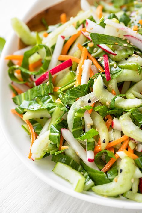 This refreshing bok choy salad is brimming with baby bok choy, shredded carrots and spicy radishes tossed with a sesame-soy vinaigrette! | thecozyapron.com #bokchoy #bokchoysalad #bokchoysaladdressing #sesamesoyvinaigrette Italian Chopped Salad, Shredded Carrots, Salad Bar, Radishes, Veggie Dishes, Asian Dishes, Low Energy, Summer Salads, Delicious Salads