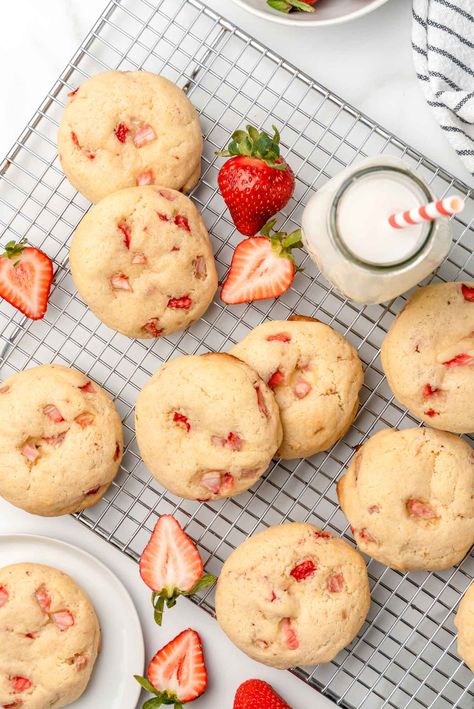 Stuffed strawberry cheesecake cookies strewn onto a wire cooling rack. A bottle of milk and sliced strawberrys are there as well. Viewed from above Fun Cookie Recipes, Stuffed Strawberry, Strawberry Cheesecake Cookies, Cheesecake Cookies Recipes, Bottle Of Milk, Recipes Cookies, Strawberry Cookies, Cheese Cookies, Baking Recipes Cookies