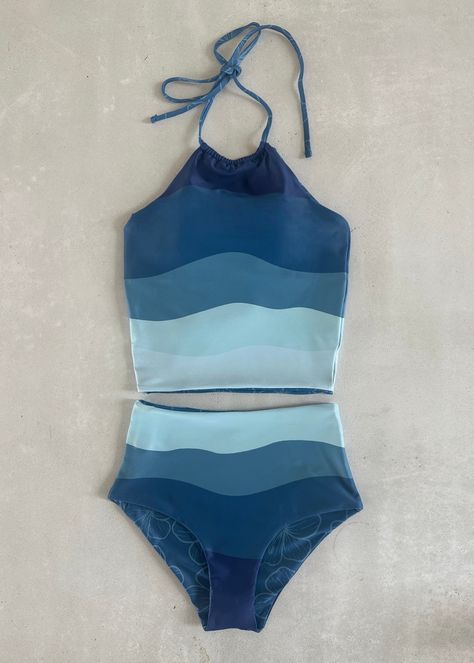 This darling reversible tankini is basically four swimsuits in one because both the top and bottom are fully reversible! The top has an added layer inside with sewn-in padding for worry-free play all day. We tested the fabrics in the salty ocean, sandy beaches, pools, and hot-tubs. It is high-quality, comfortable, and SO much fun!! Truly, a combination you won't want to live (or swim) without ;). High-waisted reversible bottoms High neck reversible top Sewn-in padding High quality fabric Full Co Cute Modest Swimwear Tankini, Rad Swim, Preppy Swimsuit, Tankini Aesthetic, Crochet Tankini, Play All Day, Swimming Suits, Reversible Top