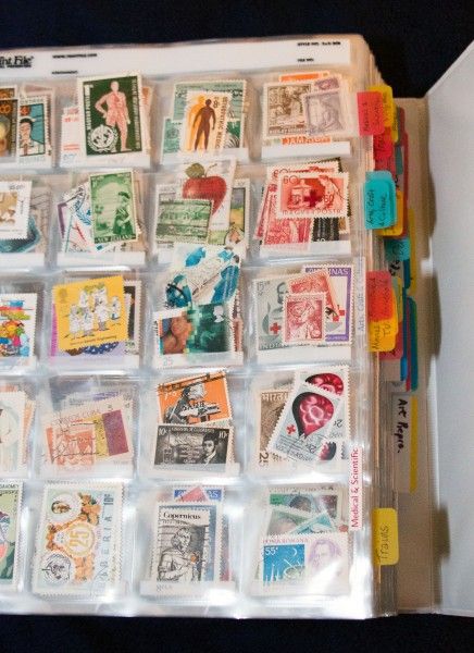 I'd like to get my hands on these stamps! Good storage idea. Stamps in slide sleeves Stamp Album Ideas, Stamp Collection Display Ideas, Stamp Collection Aesthetic, Stamp Collecting Storage, Postage Stamp Display, Stamps Aesthetic, Stamp Collection Ideas, Postage Stamps Crafts, Postage Stamp Collecting