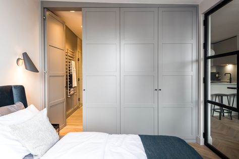 Panel door wardrobes, hidden door into secret en-suite bathroom. Wardrobe With Secret Door, Hidden Door To Walk In Closet, En Suite Pocket Door, Hidden Door To Bathroom, Secret Door Ideas Bathroom, Hidden Door Wardrobe Bedrooms, Hidden Door Walk In Closet, Secret Ensuite Door, Secret Door Wardrobe