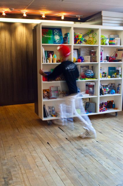 Put a bookcase on casters to create a moveable wall or secret door Studio Conversion, Bookshelf Room Divider, Shelf Divider, Temporary Room Dividers, Moveable Wall, Wall Dividers, Metal Room Divider, Glass Room Divider, Bamboo Room Divider