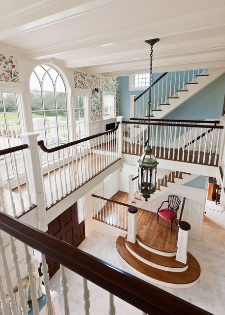 The second floor balcony brings light and life into this richly detailed space. The center panel of the Palladian window was salvaged from the previous staircase and is incorporated seamlessly into the tripartite element. The client's interest in natural history and ornithology is evident even in the wallpaper, which depicts many of the birds who migrated through this established flyway. Casas Coloniales, Casa Vintage, Dream House Rooms, Dream House Interior, Dream House Exterior, House Goals, Dream House Plans, Dream Rooms, Pretty House