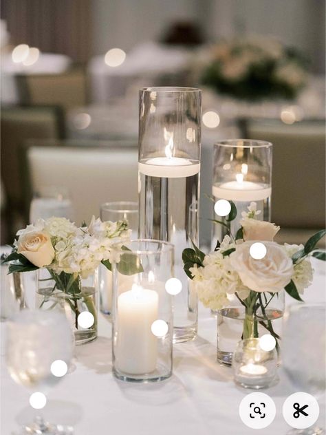 Simple White Flower Table Decor, Table Centerpieces Engagement Party, Elegant Wedding Reception Tables, Babysbreath Centerpieces Long Table, Candles On Mirror Centerpiece, Small White Centerpieces Wedding, White Round Wedding Tables, Engagement Party Centerpieces Diy, White Flowers And Candles Wedding