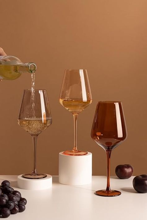 GREAT FOR ALL OCCASIONS – whether it is a casual brunch, a fancy dinner or a cocktail party with your friends and family, our wine glasses work for all of your special events. MATCH YOUR UNIQUE STYLE – our glasses come in three modern earthy tones, amber, smoke and sunset orange, that complement one another, so that you can stand out but still match the aesthetic of your home. Welcome Home Basket, Fancy Wine Glasses, Spritz Cocktails, Amber Wine Glasses, Unique Wine Glasses, Colored Wine Glasses, Orange Cocktails, Luxury Glasses, Wine Event