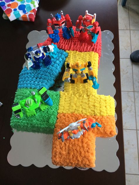 Transformer Rescue Bot Cake Rescue Bot Birthday Party, Transformers Birthday Cake Diy, Transformers Bday Cake, Simple Transformers Cake, Transformer Rescue Bots Birthday, Rescue Bots Birthday Cake, Transformer Party Ideas, Transformers Birthday Ideas, Transformer Cakes For Boys