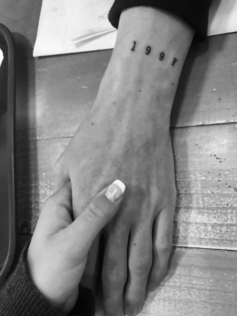 Date On Hand Tattoo, Year Tattoo On Wrist, 1929 Tattoo Number, Year Wrist Tattoos, 1979 Tattoo Ideas, Hand Tattoos Numbers, Birth Year Tattoo Wrist, 1980 Tattoo Ideas, 1979 Tattoo