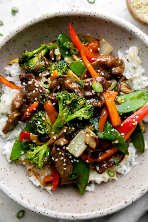 This quick & easy Beef and Vegetable Stir Fry rivals ANY takeout! Tender steak, loads of veggies, & a homemade stir fry sauce made from pantry staples. Serve over rice for a well-balanced weeknight dinner with outrageous flavor. BONUS! Since stir fry is a naturally flexible dish, you can swap ingredients with whatever you love most or happen to have on hand. Simple substitution ideas provided. #stirfryrecipes #stirfrysauce #beefstirfryrecipes #beefrecipes #easydinnerideas #dinnerrecipes Beef And Vegetable Stir Fry, Homemade Stir Fry Sauce, Vegetable Stir Fry Recipe, Homemade Stir Fry, Steak Stir Fry, Beef Stir Fry Recipes, Asian Recipe, Tender Steak, Broccoli Stir Fry