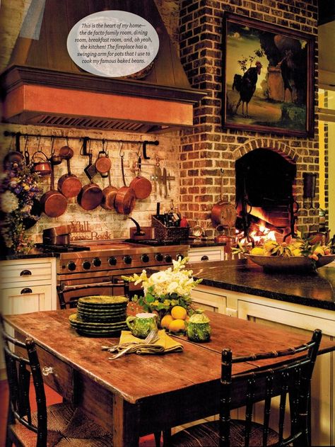 Country Kitchen Fireplace, Fireplaces In Kitchens, Paula Deen Kitchen, Savannah Style Homes, Brick Fireplace In Kitchen, Hanging Copper Pots In Kitchen, Kitchens With Fireplaces, Fireplace In Kitchen, Fireplace In The Kitchen