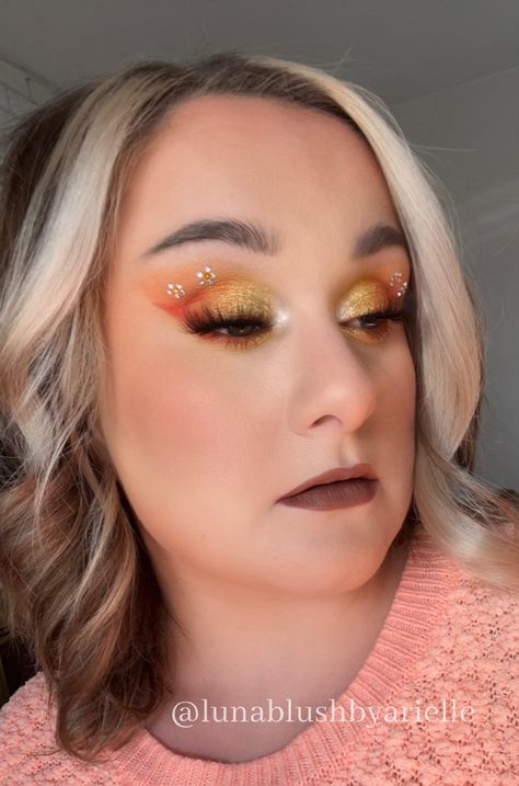 Rhinestone flower makeup #orangeandyellow #springmakeup Orange Rhinestone Makeup, Flower Rhinestone Makeup, Gem Makeup, Face Rhinestones, Rhinestone Makeup, Flower Makeup, Rave Makeup, Yellow Springs, Spring Makeup