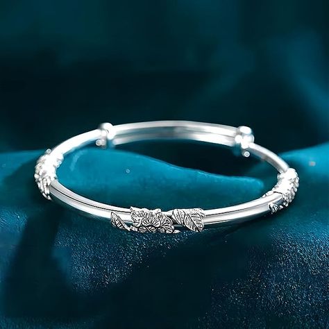 Crafted from high-quality silver, this bracelet boasts a sleek and modern design that is perfect for any occasion. The shining silver material is polished to a high shi Silver Bracelet Designs, Bracelets Design, 925 Silver Bracelet, Birthday Jewelry Gift, Silver Bangle Bracelets, Sterling Silver Bangles, Flower Bracelet, Blooming Flowers, Silver Bangles