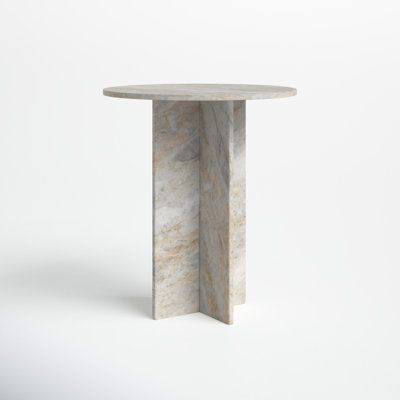 Made entirely of natural marble, the Harmon Accent Table is a timeless design. The gray, white, and blush veining in the marble will introduce instant texture into space but the clean lines of the stone occasional table make it a pared-down choice. Because marble is a natural material, the patterns on each of these marble accent tables will vary. Joss & Main | Joss & Main Evelyn Marble Top Pedestal End Table in Gray/White/Blush | Size 20.75'' H X 18'' W X 18'' D