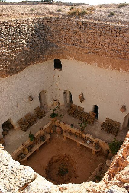 Underground home in Libya. - Imgur Case Sotterranee, Underground House, Earth Sheltered, African Architecture, Underground Homes, Cave House, Unusual Homes, Vernacular Architecture, Earth Homes