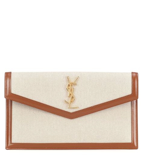 Uptown Canvas Clutch | Saint Laurent - Mytheresa Parisian Glamour, Stella Logo, Ysl Clutch, Beige Bag, Canvas Clutch, Shades Of Beige, Saint Laurent Bag, Monogram Logo, Leather Clutch