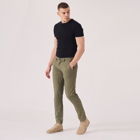 "Introducing our stylish Regular Fit Stretch Chino Trouser in a refreshing Light Green shade. Designed for both comfort and style, these trousers are made with a stretch fabric to ensure a perfect fit. Ideal for any occasion, dress them up or down with ease. The classic chino design features an adjustable waistband and button closure for a secure and tailored look. Upgrade your wardrobe with these versatile and trendy chinos that will give you a polished and effortlessly cool vibe. Product Features: Light Olive Green Stretch Fabric Regular chino fit Tonal buttons Welt pockets to back 98% cotton 2% spandex Our Model is 5'11\" and wears size 32. To find the perfect fit for yourself, check our Size Guide FIND YOUR SIZE and check our size guide to find your perfect fit. Size = 30 - 40 Waist = Green Chino Outfit Men, Olive Pants Outfit, Chinos Men Outfit, Trousers Outfit Men, Casual Look For Men, Green Pants Men, Green Pants Outfit, Dark Green Pants, Olive Pants