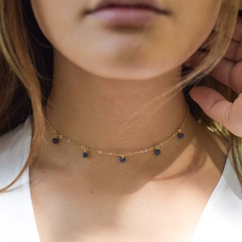 The perfect example of bohemian, free-spirited style - say hello the sapphire bead drop choker! Delicately pretty, this stunning choker is hand crafted using the traditional technique of wire wrapping to drop the precious gemstones from the chain. It makes the ideal present for adventurers, wanderers and wild freedom-seekers. Whether worn alone or layered with another necklace (or three!), this bead drop choker will be something you will love to wear whatever the season. Bronze Jewellery, Delicate Choker, Bohemian Jewellery, Free Spirit Style, Precious Gemstones Jewelry, Bronze Jewelry, Jewelry Care Instructions, Power Crystals, Crystal Choker