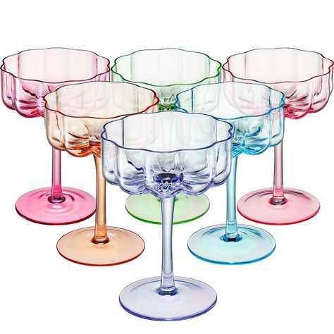 PRICES MAY VARY. Introducing the Bright Colored Flower Coupes, a set of six exquisite glassware pieces that combine elegance with a unique touch of color. Standing at 5.1 inches tall with a diameter of 3.9 inches, these coupes offer a capacity of 7 ounces, allowing you to enjoy your favorite martinis or cocktails in style. The standout feature of these glasses is their stunning bright colors and intrique design. Each glass is beautifully crafted and colored in pink, magenta blue, green, and oran Coupe, Pastel, Prosecco Mimosa, Champagne Martini, Cocktail Glassware, Colorful Cocktails, Colored Glassware, Champagne Cocktail, Flower Vintage