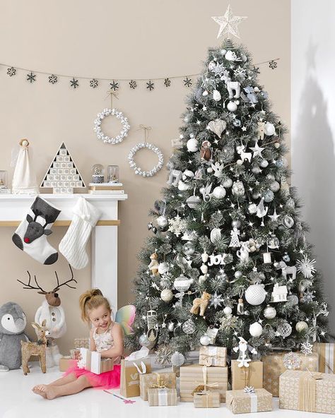 Go all out festive with your favorite color this season. Glamorous Christmas Tree, Grey Christmas Tree, White Christmas Tree Decorations, Christmas Tree Inspo, Chirstmas Decor, Pretty Christmas Trees, Silver Christmas Decorations, Christmas Tree Decorating Themes, Grey Christmas