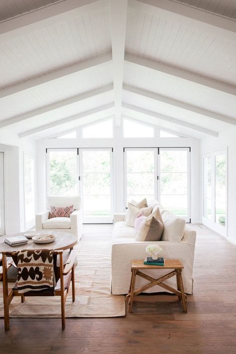 Windows (in this case doors) with those dividers and the windows above following the roof line. White Beams, Coastal Living Rooms, Ideas Hogar, Coastal Living Room, Vaulted Ceilings, Large Living Room, Vaulted Ceiling, Humble Abode, Family Rooms