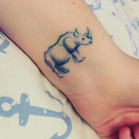 Love this, would want to adapt it so it looked like a patronus! More Rhinosaurus Tattoo, Tiny Hippo Tattoo, Tiny Rhino Tattoo, Rhino Head Tattoo, Simple Rhino Tattoo, Rhino Tattoo, Wrist Tattoo Cover Up, Clever Tattoos, Bug Tattoo