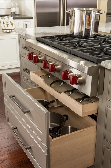 Great idea to have a top narrow pull-out shelf under the stove for lids Modern Farmhouse Kitchen Cabinets, Custom Kitchen Remodel, Transitional Kitchen Design, Farmhouse Kitchen Cabinets, Kitchen Cabinets Makeover, Custom Kitchen Cabinets, Cabinet Features, Kitchen Cabinet Storage, Transitional Kitchen