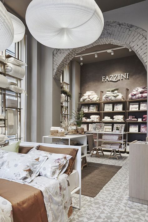 Hangar Designs Fazzini's New Milanese Flagship Store Textile Shop Design, Home Textile Design, Ikea Store Design, Furniture Store Interior, Hangar Design, Furniture Store Design, Textile Shop, Showroom Interior Design, Linen Store