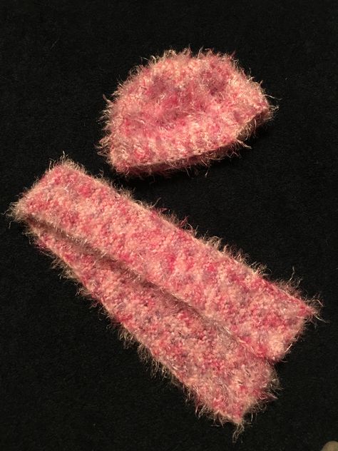 Crochet Projects With Fuzzy Yarn, Fuzzy Yarn Crochet, Things To Crochet With Pink Fluffy Yarn, Fun Pink Yarn Hat, Pink Warm Hats In Acrylic Yarn, Eyelash Yarn Crochet Scarf, Winter Hand-knitted Pink Crochet Hat, Pink Yarn, Scarf Hat