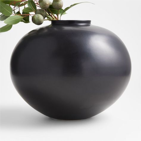 Shop Jimena Black Round Vase. Beautifully minimalist yet generous in shape, our Jimena black round vase swells elegantly. Its satiny finish and delicate rim complete the refined look, allowing the focus to stay on the vessel's perfectly simple form. Round Vases, Pottery Creations, Modern Halloween Decor, Chic Halloween Decor, Affordable Kitchen, Faux Branches, Christmas Entryway, Black Front Doors, Artificial Floral Arrangements