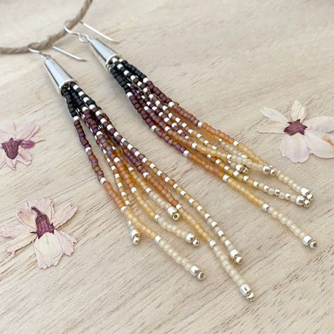 "Heavy gauge sterling silver ear wires are sturdy and hypoallergenic. 0.875\" wide x 4.5\" long from the top of the ear wire to the tip of the longest fringe. Light weight beaded tassel earrings for any occasion with a modern minimalist cone topper and a deep brown, mauve, amber and honey gradient, accented with silver. A lovely medium long size, these fringe beaded earrings are simply striking, light weight and great with a wide variety of wardrobe styles." Cone Beaded Earrings, Beaded Cone Earrings, Ombre Beaded Earrings, Silver Beaded Earrings, How To Make Beaded Earrings, Fringe Earrings Diy, Fringe Light, Fringe Beaded Earrings, Long Beaded Earrings