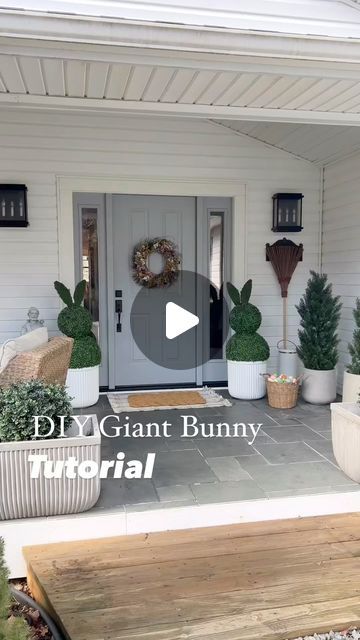 Maria Simonelli on Instagram: "DIY Giant Topiary Bunnies Tutorial   Comment Bunny if you want me to message you the supples list and links  These giant topiary bunnies are so easy to make and the look so cute in your porch planters.  I took two faux boxwood walls and attached them together with zip ties. I used self sticking moss that I attached to cardboard ears and placed them on top. I love how they dress up the spring porch.   . **Materials You Need**:  - Two faux boxwood balls Mine are 17” and 13” sizes  - Zip ties  - Self-sticking moss  - Cardboard for ears  - Popsicle Sticks   1) Take the two faux boxwood balls secure them together with zip ties   2) Cut out large bunny ear shapes from the cardboard.  3) Cover the cardboard ears with self-sticking moss to match the boxwood. I hot gl Bunny Topiary, Rabbit Topiary, Topiary With Bow, Boxwood Bunny Topiary, Boxwood Spiral Topiary Front Porch, Spring Topiary, Boxwood Balls, Giant Bunny, Spring Planter