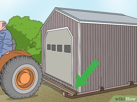 4 Ways to Move a Shed - wikiHow Cheap Storage Sheds, Rental Makeover, Big Sheds, Camping Trailer Diy, Cheap Sheds, Barn Storage, Simple Shed, Shed Sizes, Dog Yard