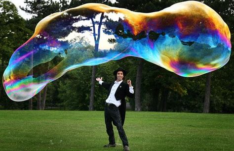 Bubbleologist Samsam Bubbleman blows the world's largest free-floating soap   bubble. Lance Stewart, Bubble Recipe, David Foster Wallace, Giant Bubbles, Travel Crafts, Kids Bubbles, Big Bubbles, Blowing Bubbles, Soap Bubbles