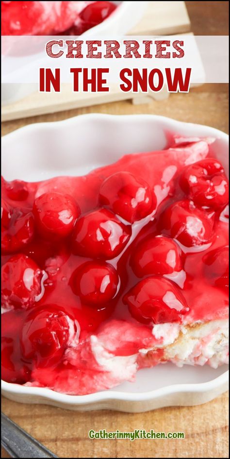 Revel in the timeless charm of Cherries in the Snow, a delectable dessert that combines fluffy angel food cake, rich cream cheese, and luscious cherry pie filling. Perfect for Christmas Cherry Desserts or as a delightful treat at any family gathering. This old fashioned recipe invites a taste of nostalgia blended superbly with creamy Cool Whip, ensuring each bite is as memorable as it is delicious. Angel Food Cake With Pie Filling, Angel Food Cake And Cherry Pie Filling, Cherry Deserts Fresh Cherries, Cherries In The Snow Dessert, Cherry Cobbler Recipe Pie Fillings, Cherries In The Snow Recipe, Classic Cherry Delight, Old Fashioned Desserts, Cherry Pie Filling Recipes