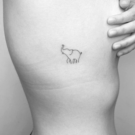 Minimalistic style elephant tattoo done in fine line. Joshua Tattoo, Arm Elephant Tattoo, Simple Elephant Tattoo, Tiny Elephant Tattoo, International Tattoo, Africa Tattoos, Traditional Tattoo Designs, Thailand Tattoo, Elephant Tattoo Design