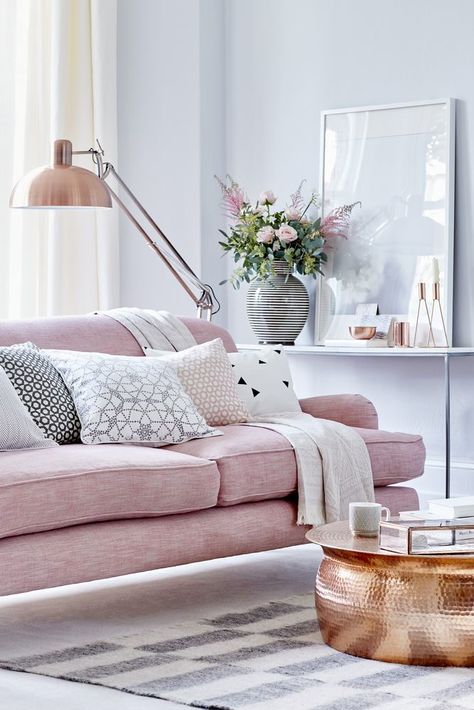 Layer soft rose pink with grey, choose a classic sofa as the room’s centrepiece, then introduce pattern with decorative cushions and a rug. Contrast the soft colours with a statement floor lamp and coffee table. For more living room ideas visit housebeautiful.co.uk Feminine Living Room, Smart Tiles, Deco Rose, Interior Vintage, Pink Sofa, Versace Home, A Living Room, Design Living, Design Case