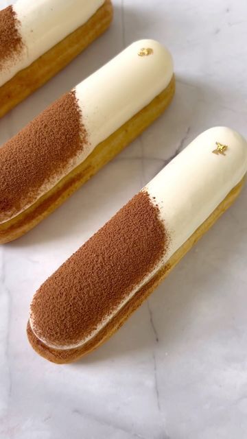 World of Eclairs on Instagram: "Tiramisu eclairs in the making🤎☕️ Do you think tiramisu is more a summer☀️ or a winter time❄️ dessert? #frenchpastry #dessertvideo #bakingreel #bakingrecipe #eclair #eclairs #instapastry #pastrycheflife #dessertaddict #sweettooth #chouxpastry #patisserie #эклеры #эклер #tiramissu #coffeedessert #trendingreelsvideo #trendingreel" Savoury Eclairs, Eclair Tiramisu, Eclair Decoration, Eclairs Decoration, Tiramisu Eclairs, Eclairs Recipe, Eclair Dessert, Eclairs Dessert, Fancy Desserts Recipes