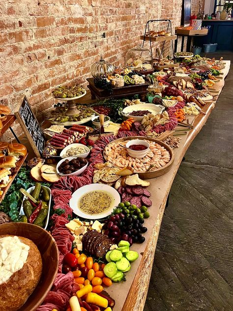 Large table filled with charcuterie, cheese, fruit, nuts, olives, veggies, sliders, dips, butter board, cream cheese board, shrimp cocktail and all the good stuff! Cheese Board For Wedding, Epic Grazing Table, Large Crowd Charcuterie Board, Cheese Tables Ideas, Wedding Antipasto Table, Fall Grazing Table Wedding, Long Grazing Table, Big Party Charcuterie Board, Long Grazing Board