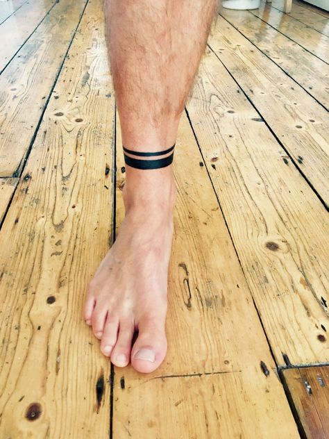 Ankle bracelet tattoo, black bands. Ankle Bracelet Tattoos, Black Band Tattoo, Men's Ankle Bracelet, Ankle Band Tattoo, Ankle Tattoo Men, Leg Band Tattoos, Bracelet Tattoos, Band Tattoos For Men, Tattoo Band