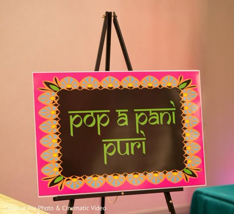 Diwali Stall Decoration Ideas, Desi Theme Party, Holi Event Decor Ideas, Sangeet Sign Board, Chaat Party Decoration, Stall Decor Ideas, Outdoor Sangeet Decor Night, Bollywood Theme Decor Ideas, Bollywood Night Decor